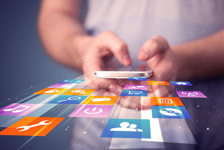 Man holding smart phone with colorful application icons comming