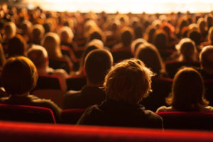 audience watching theater play